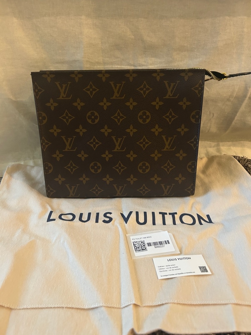 Louis Vuitton Monogram Canvas Toiletry Pouch in Brown with credit card slots